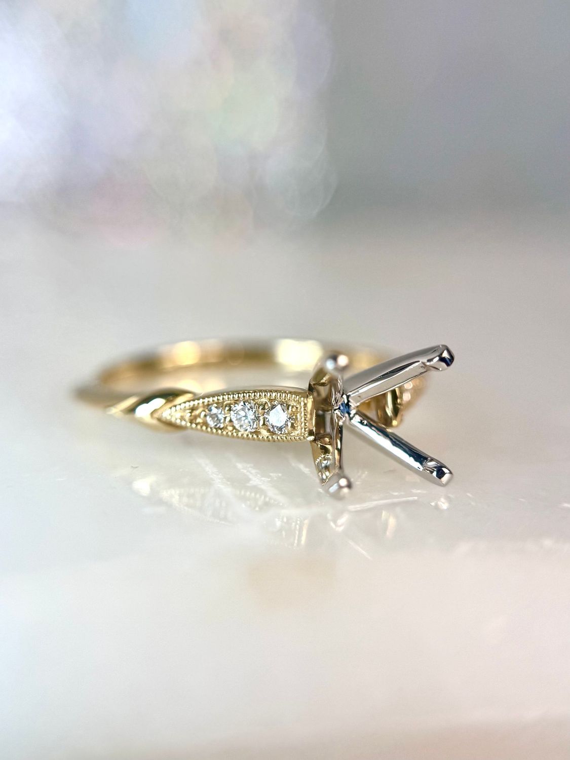 Gabriel ER11826R4M44JJ 14k Yellow Gold Round Engagement Ring Mounting (Center diamond not included) Gabriel ER11826R4M44JJ 14k Yellow Gold Round Engagement Ring Mounting (Center diamond not included)