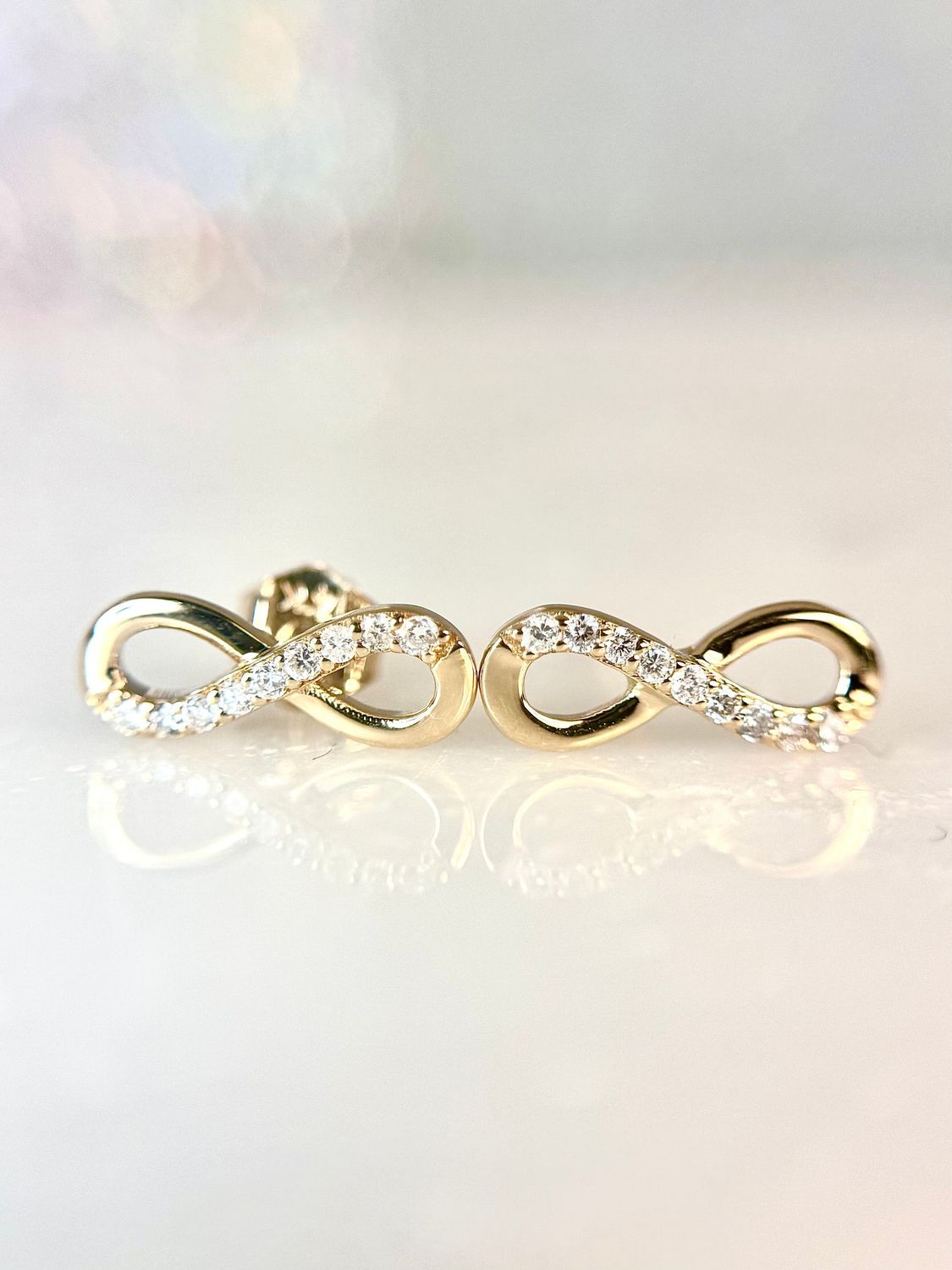 JG221522  14k Yellow Gold Diamond Infinity Earrings