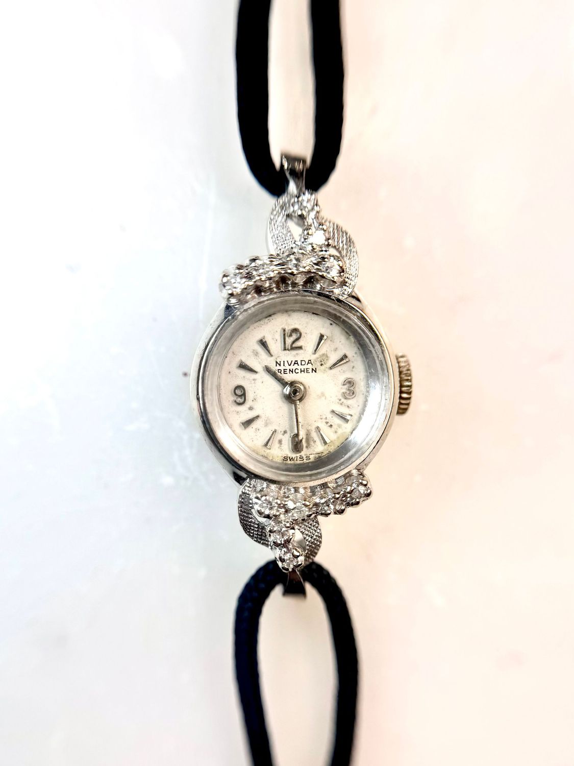 EST188  Estate 14k White Gold Nivada Grenchen diamond watch with black strap