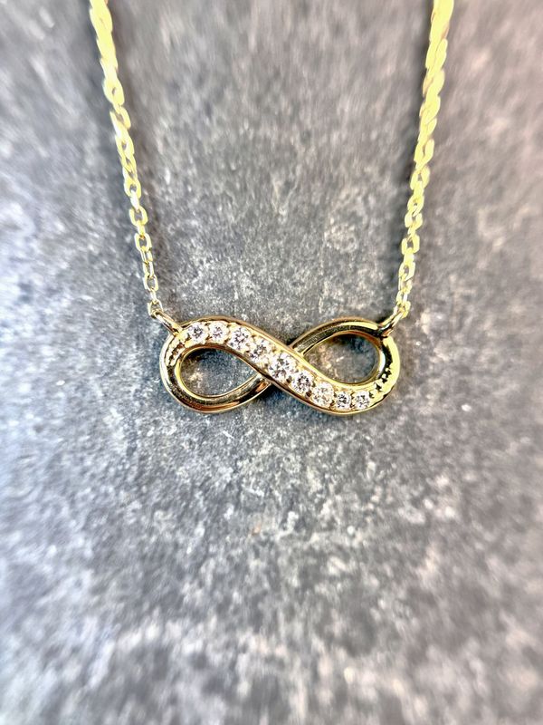 Grandeur N3443 14k Yellow Gold Diamond Infinity Necklace Grandeur N3443 14k Yellow Gold Diamond Infinity Necklace