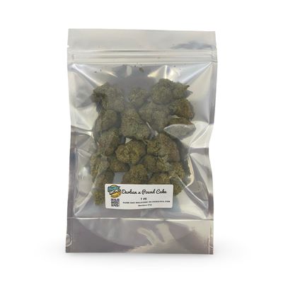 Durban x Pound Cake cannabis flower in clear ounce bag – high-quality hybrid strain with frosty buds and dessert-like aroma