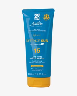 DEFENCE SUN LATTE FLUIDO SPF15