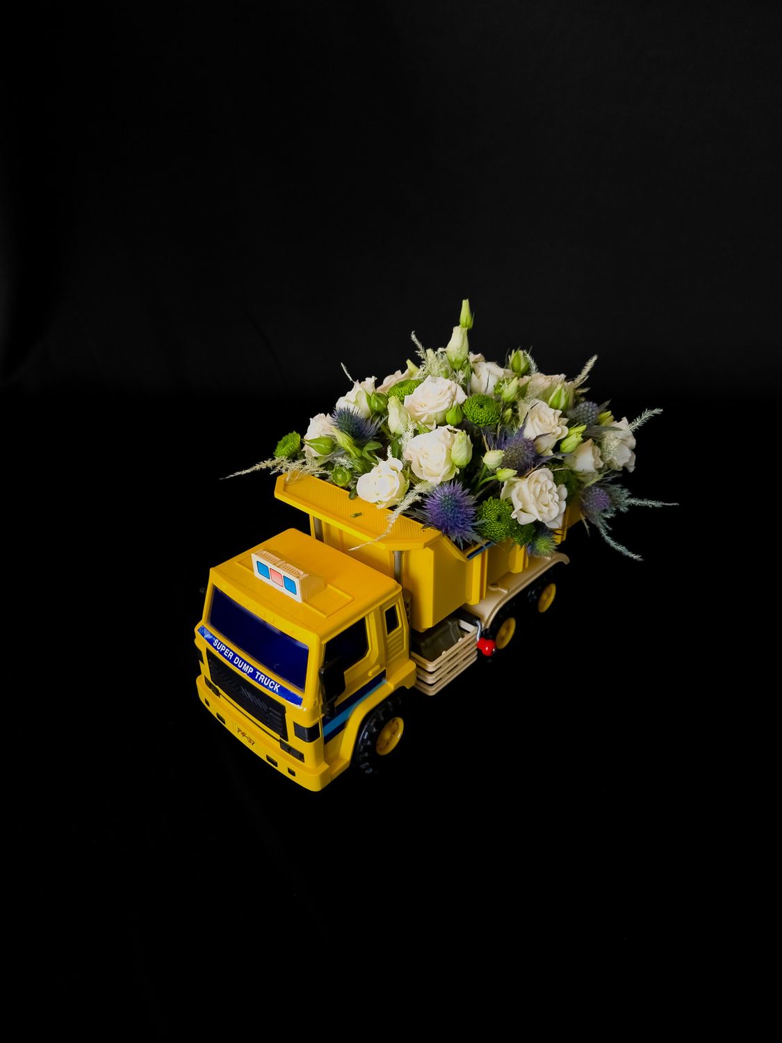 Bloemstuk Speelgoed
