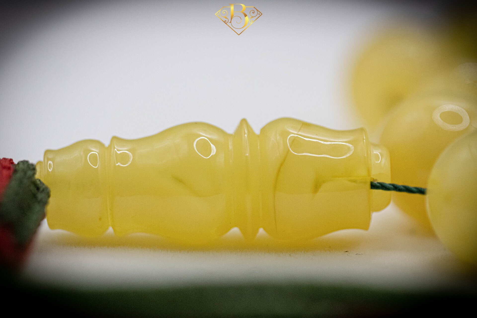 Yellow Round Shape Rosary Red/Green Tassel