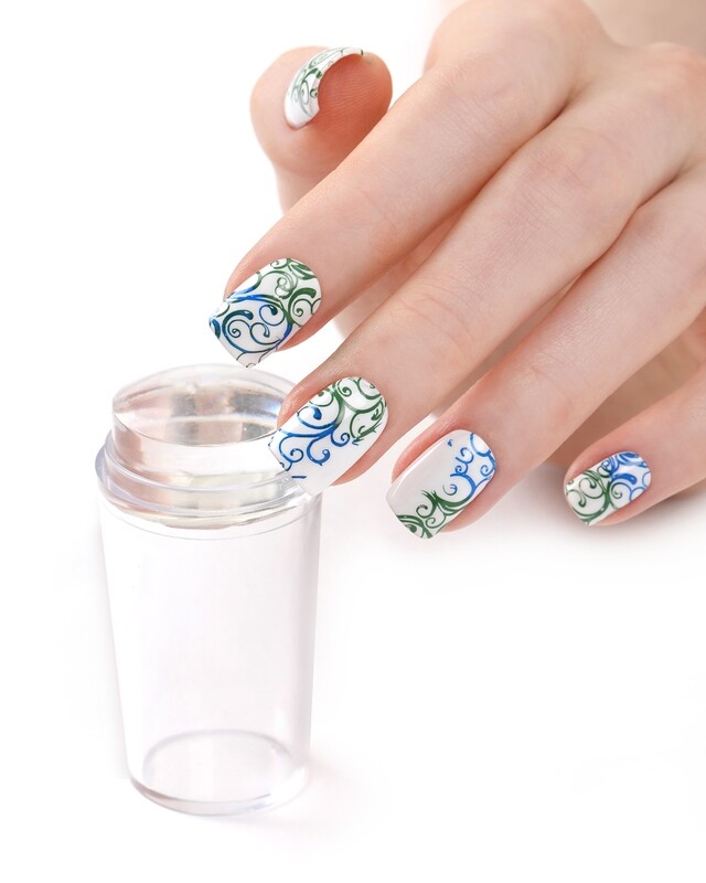 Nail stamper with scraper