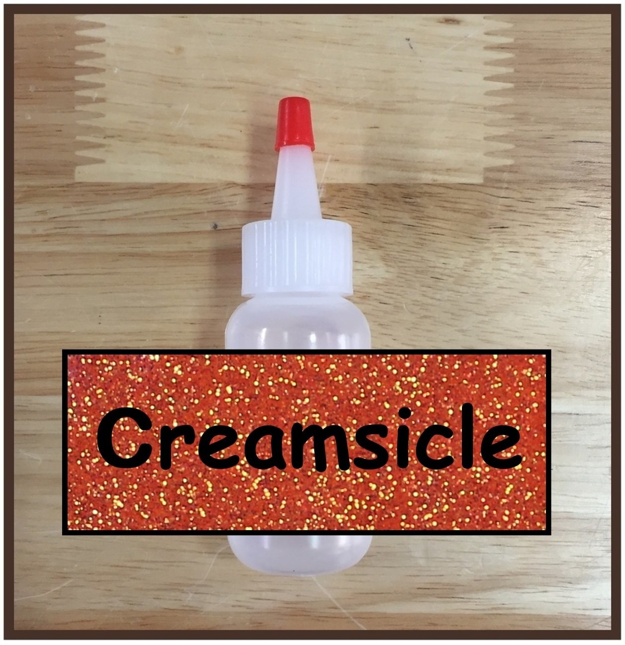 CLEARANCE! Creamsicle Glitter Poof