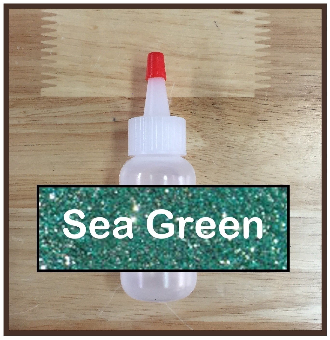 CLEARANCE! Sea Green Glitter Poof