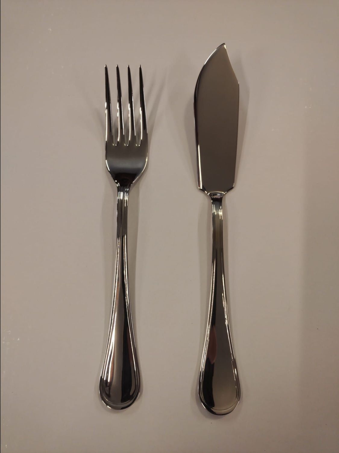 Coppia servire pesce elixir acciaio inox