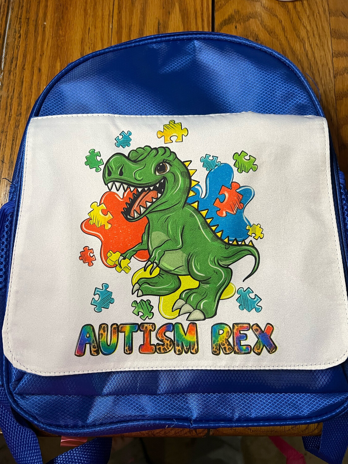 Autism Rex Blue Book bag