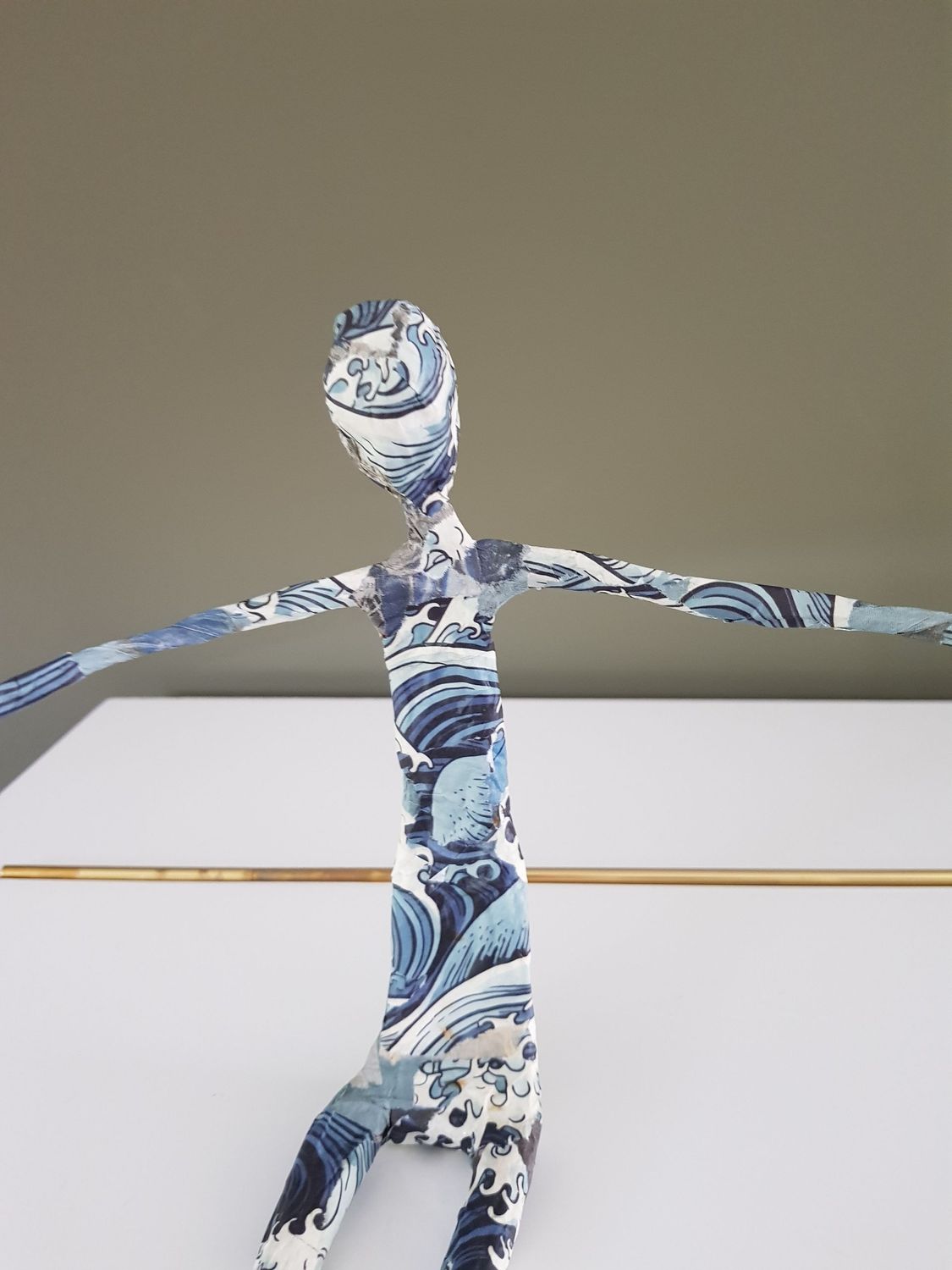 Troostmannetje middel, blauwtinten