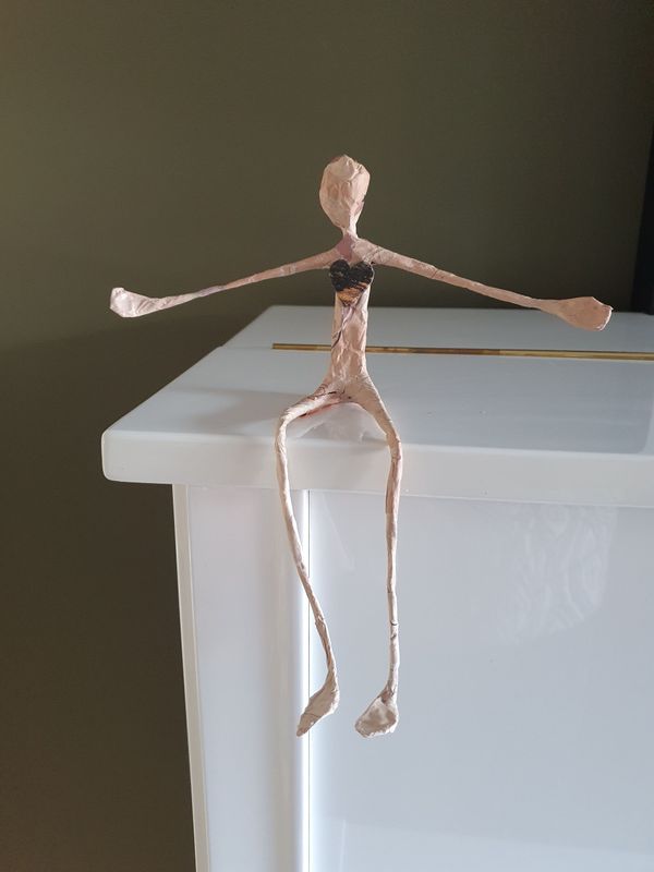 Troostmannetje, klein formaat, met hartje