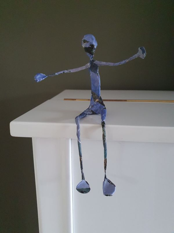 Troostmannetje klein, blauwtinten