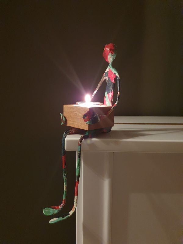 Troostmannetje met waxinelichthouder