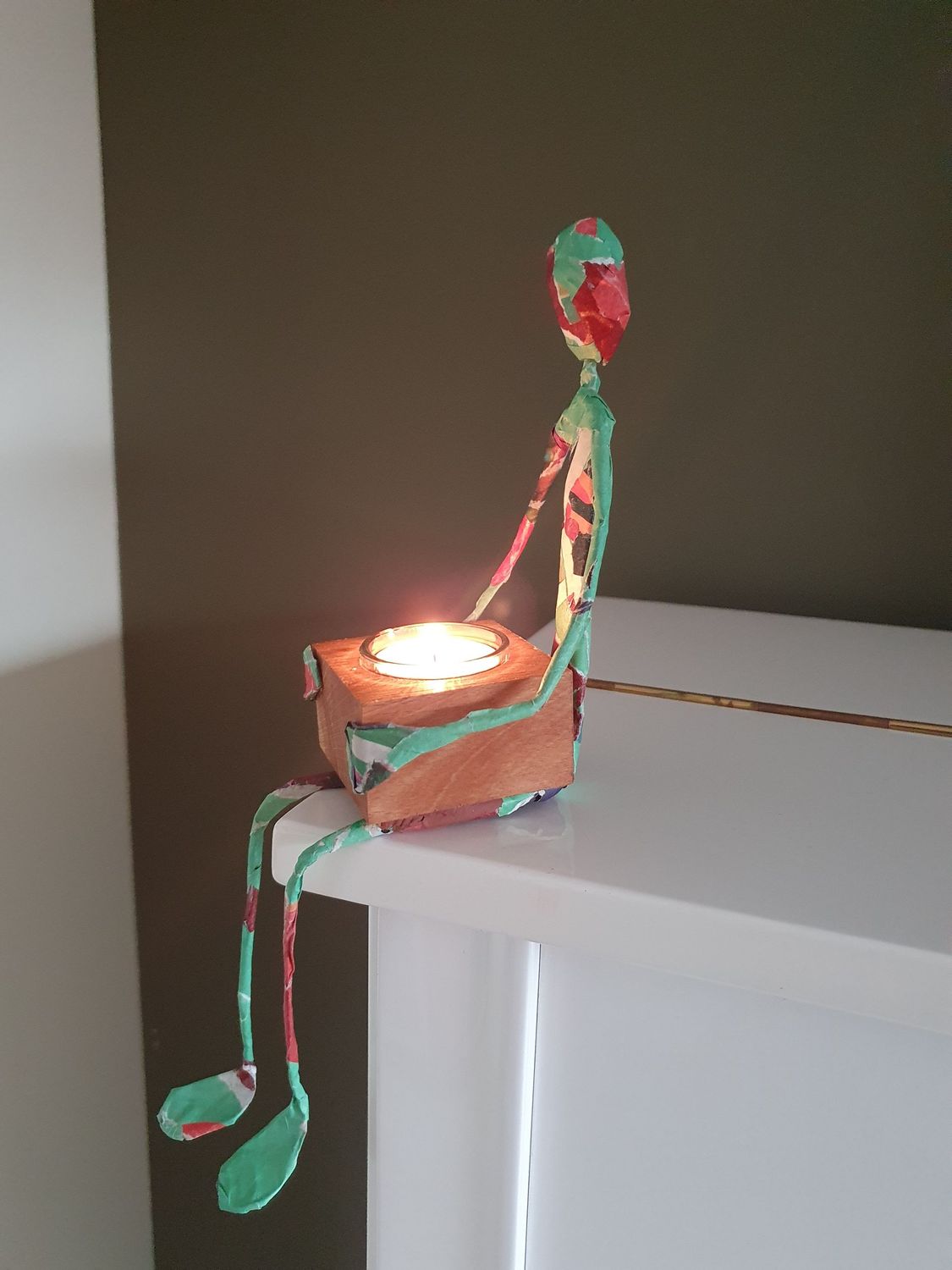 Troostmannetje met waxinelichthouder