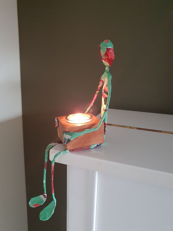 Troostmannetje met waxinelichthouder