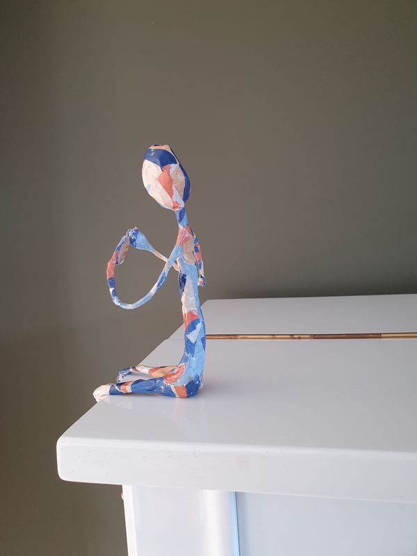 Troostmannetje klein blauw, oranje, beige Troostmannetje klein blauw, oranje, beige