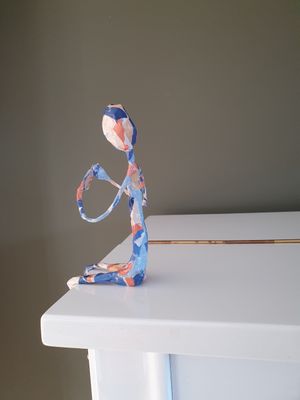 Troostmannetje klein blauw, oranje, beige Troostmannetje klein blauw, oranje, beige