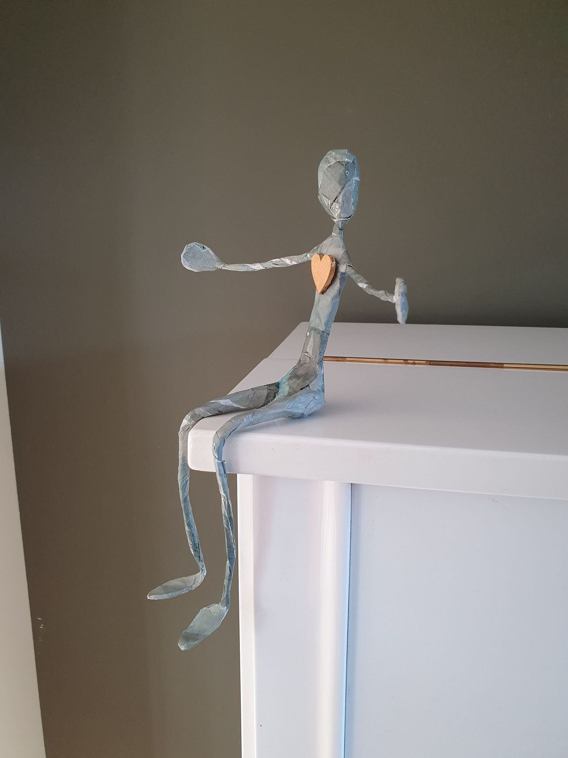 Troostmannetje klein, met hartje op de borst