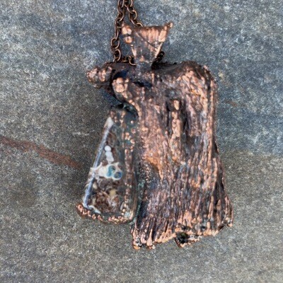 Turritella Agate in Copper Clad Wood