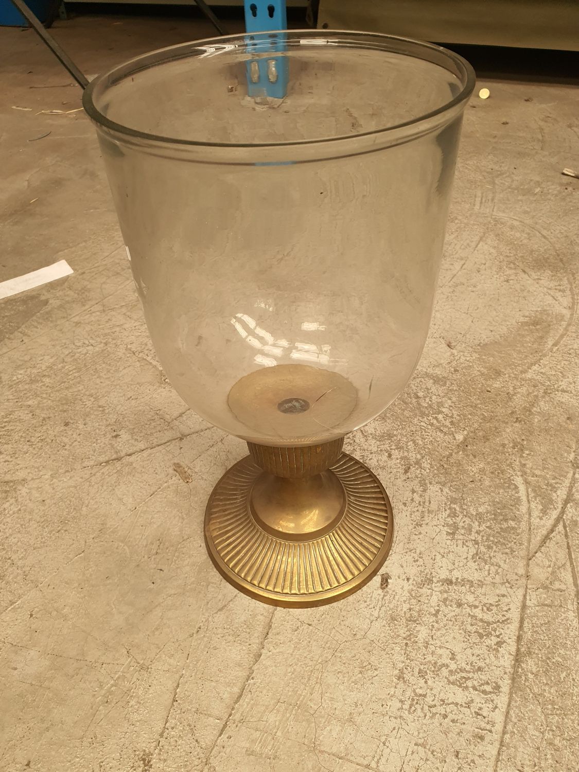 Glass candle holder with brass base