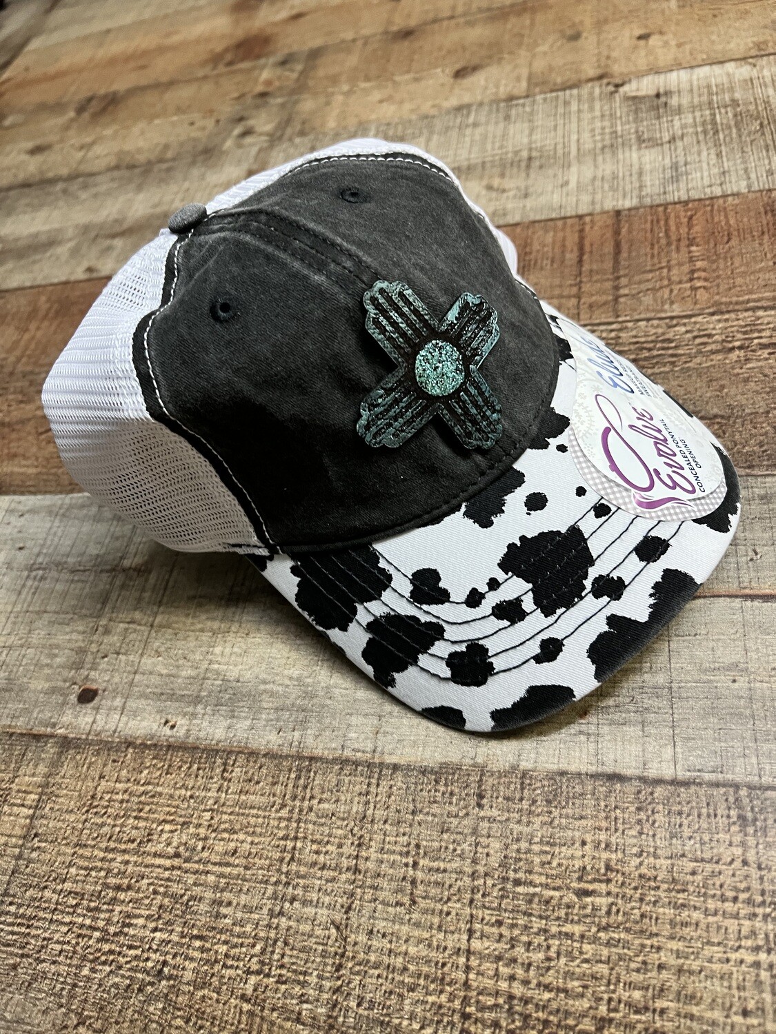 Black Turquoise Zia on Cow Print Ponytail Hat 