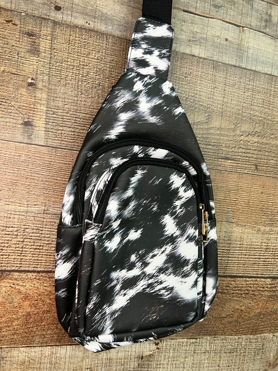 Black Cow Print Sling Bag
