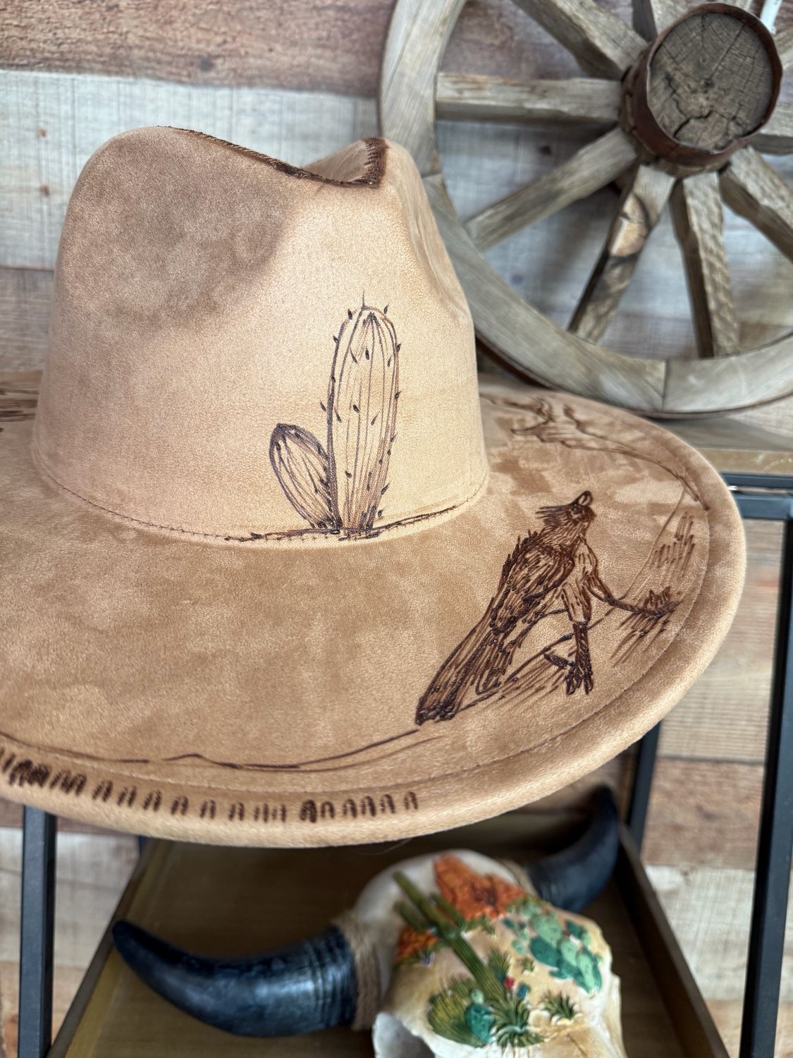 One of a kind hand burned hat with a roadrunner and cactus that represents the southwest.  