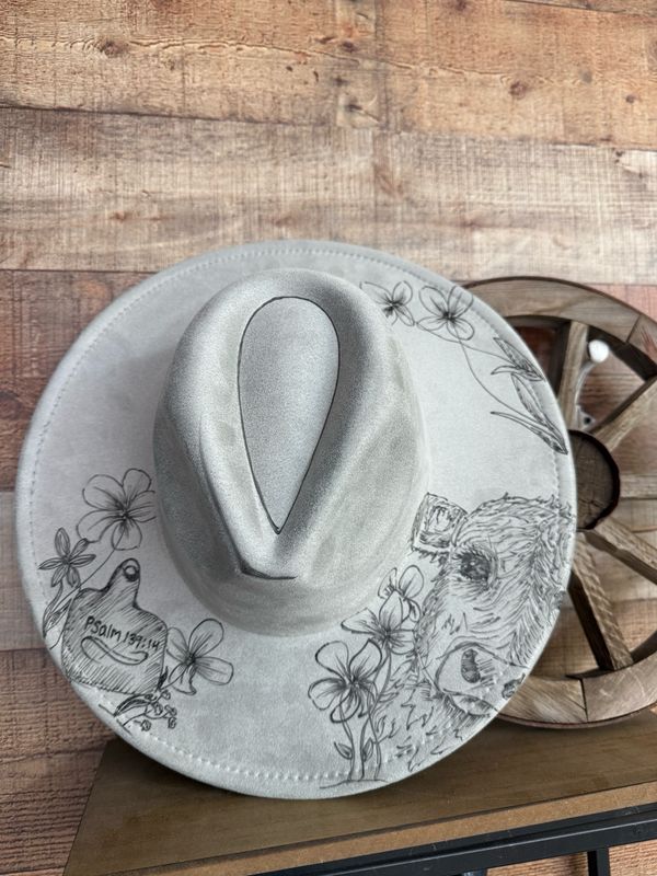 Hand burned light gray suede cowboy hat featuring a detailed cow illustration, floral designs and a Psalm 139:14 