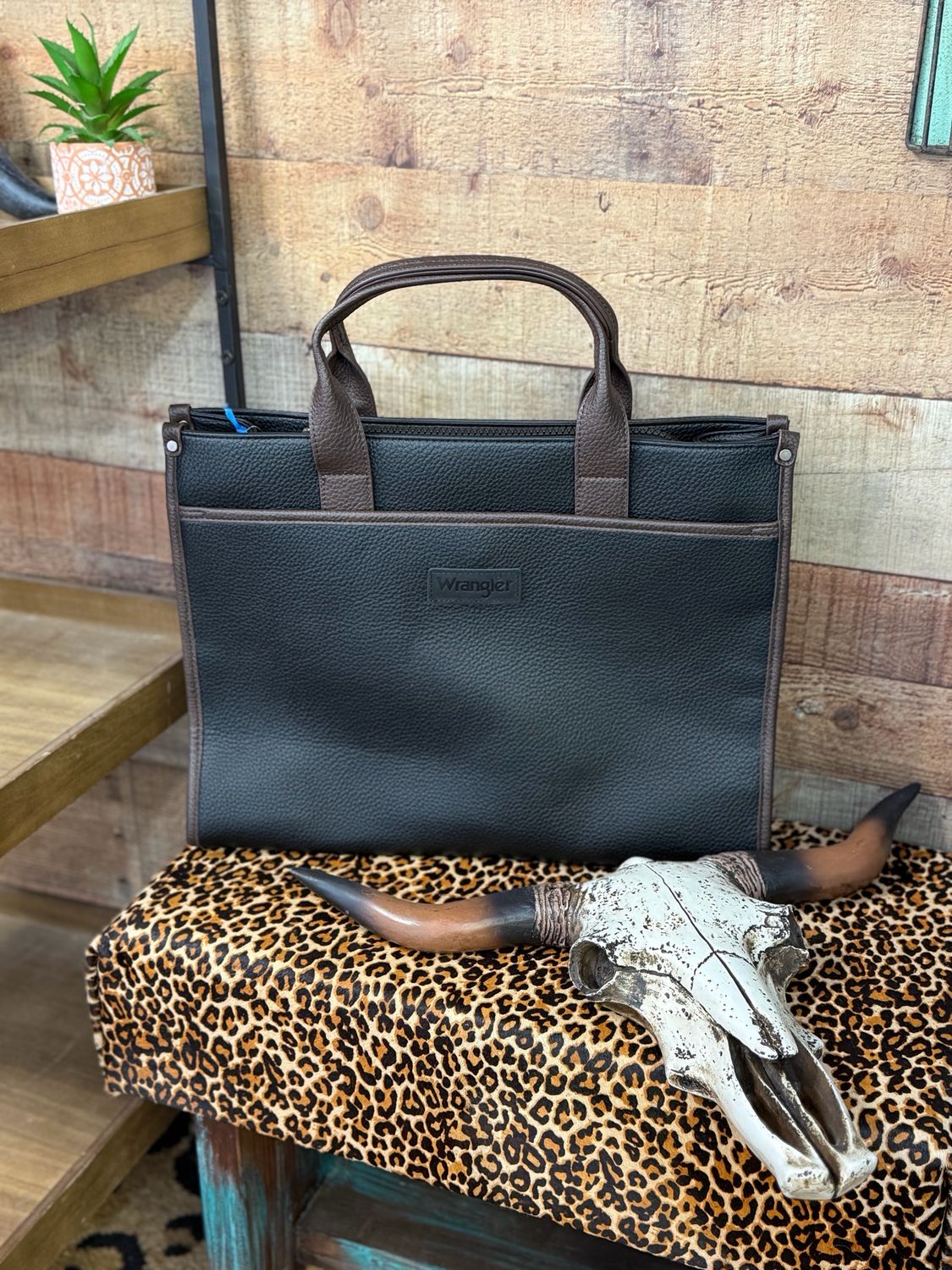 Wrangler Carry-All Large Tote Work Tote/Crossbody Inside of the bag includes a padded compartment for your electronics, roomy