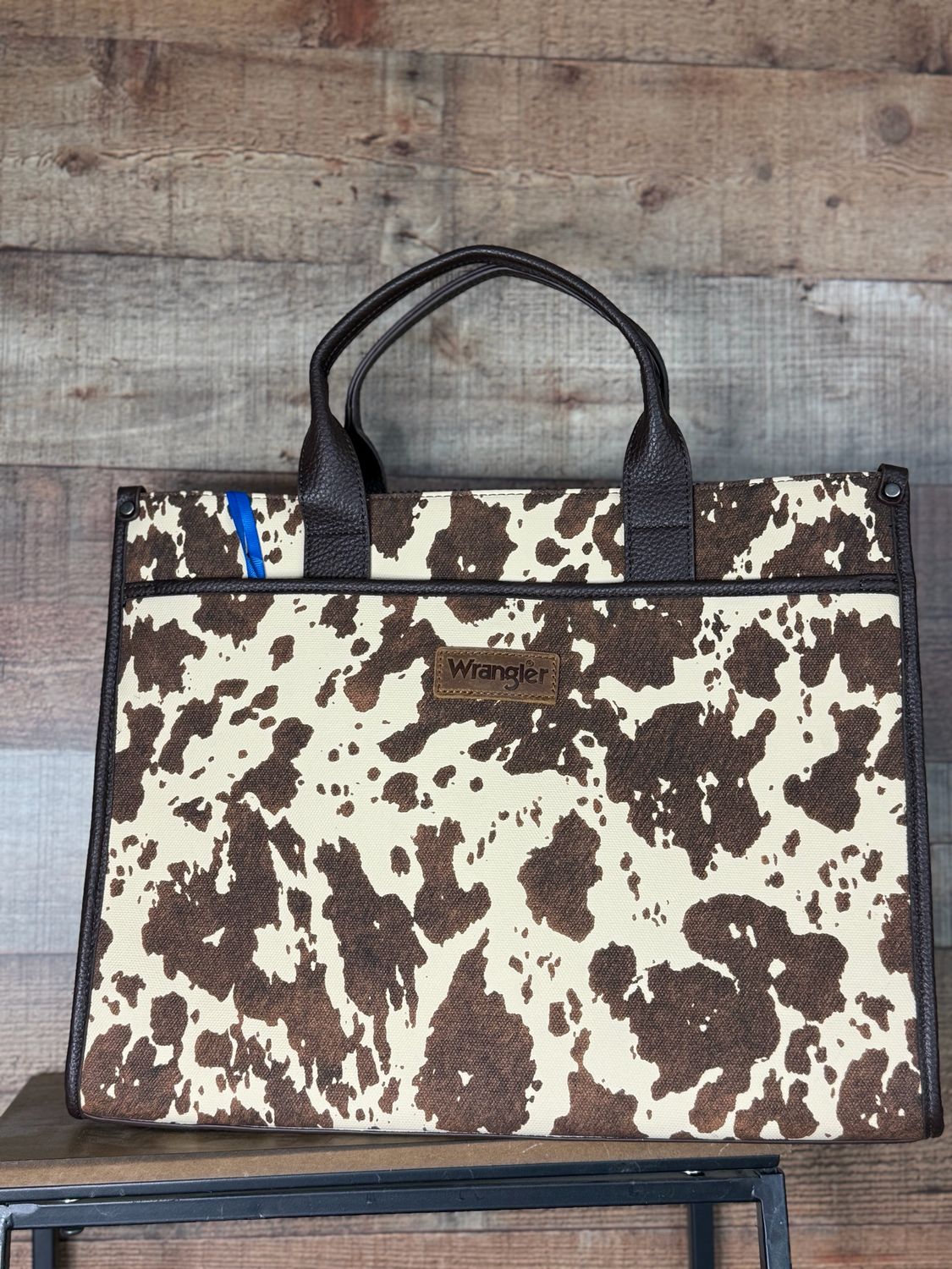 Wrangler Carry-All Large Tote Work Tote/Crossbody Inside of the bag includes a padded compartment for your electronics, roomy