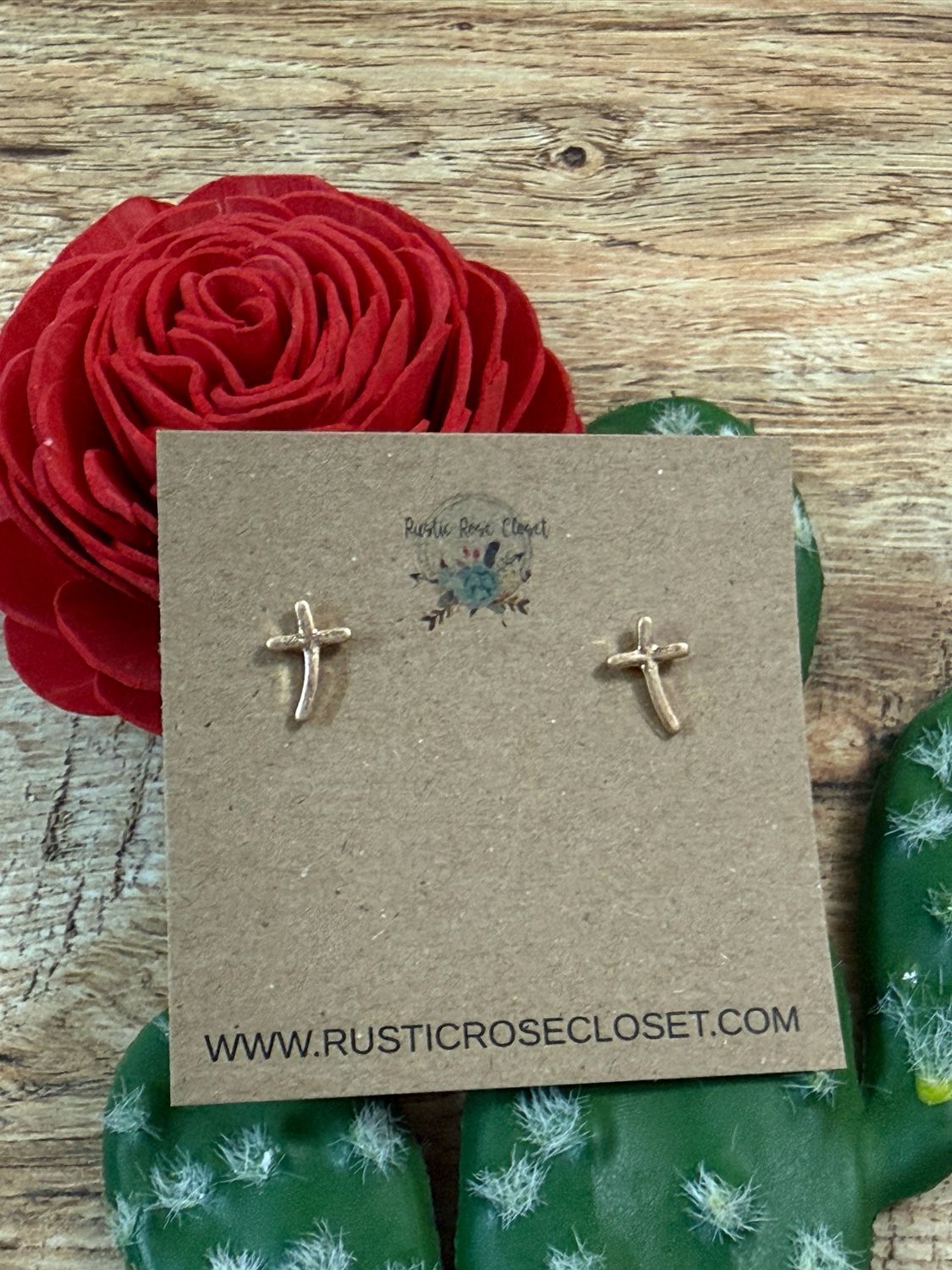 Curved Gold Cross Stud Earrings
