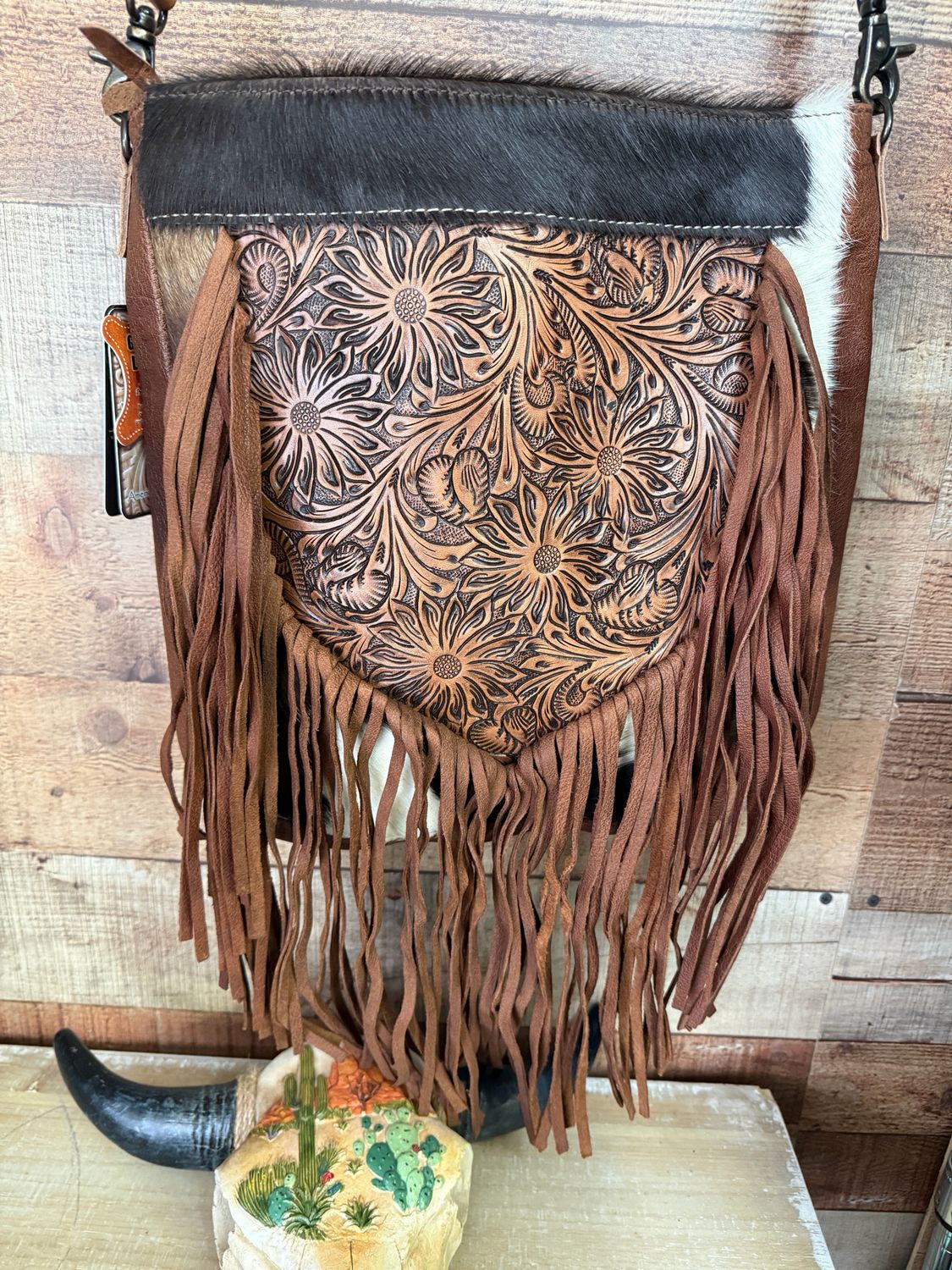 Cowhide Tooled Fringe Messenger Bag
