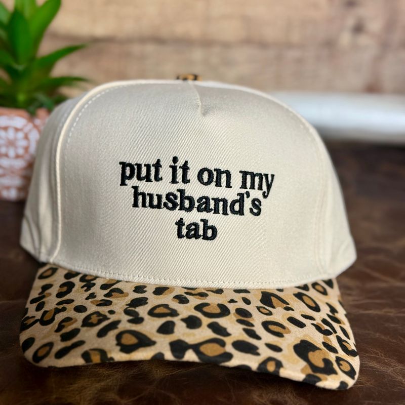 Put It On My Husband’s Tab Leopard Embroidered Trucker Hat