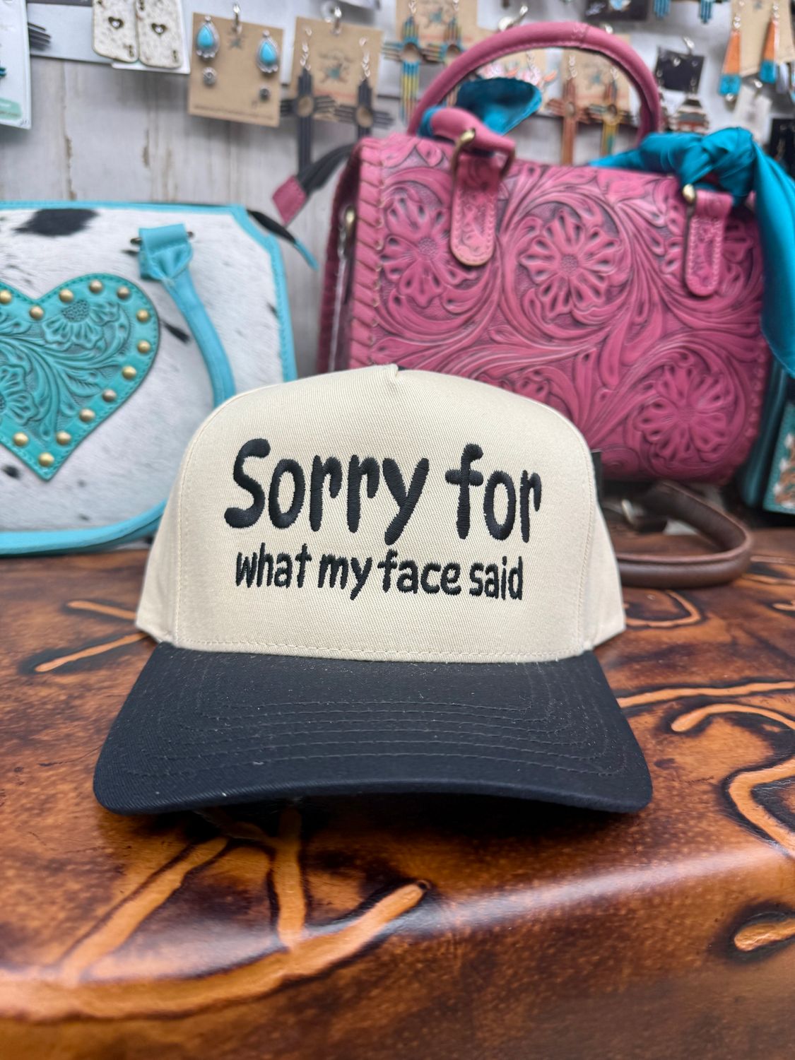 Sorry For What May Face Said Embroidered Trucker Hat