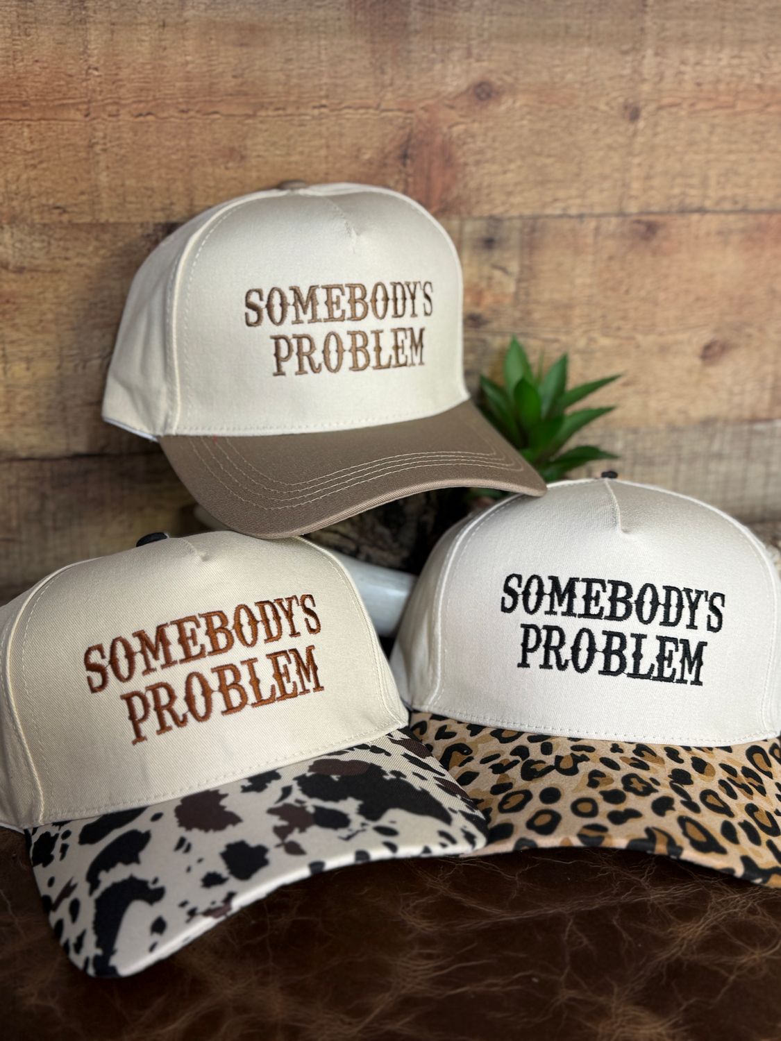 Somebody's Problem Embroidered Trucker Hat