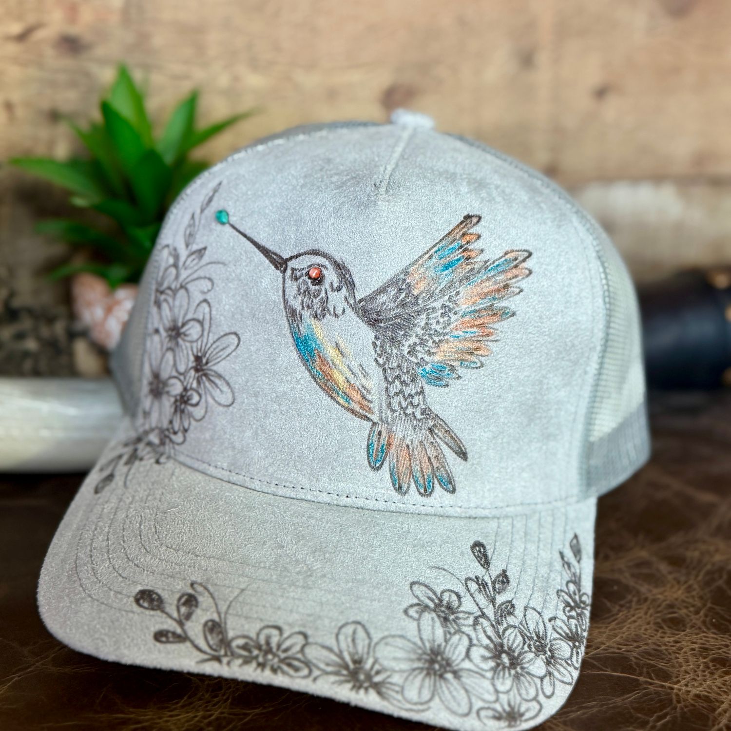 Turquoise Spiny Hummingbird Burned Trucker Hat