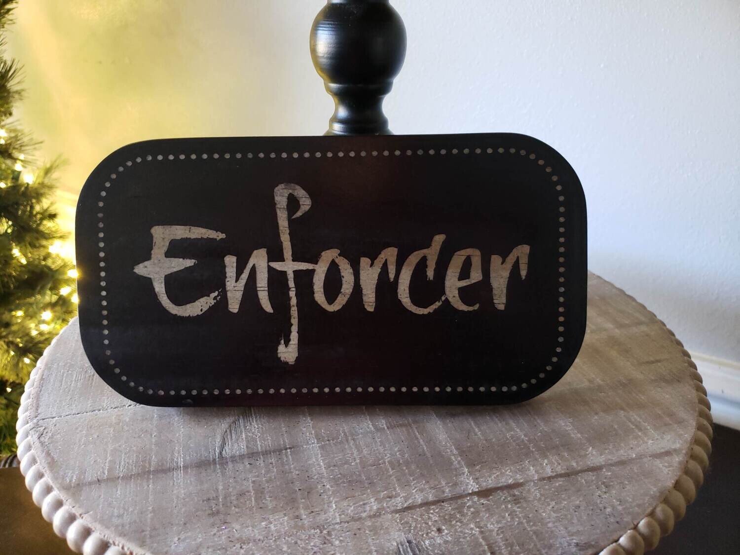 Enforcer Bookshelf Sign