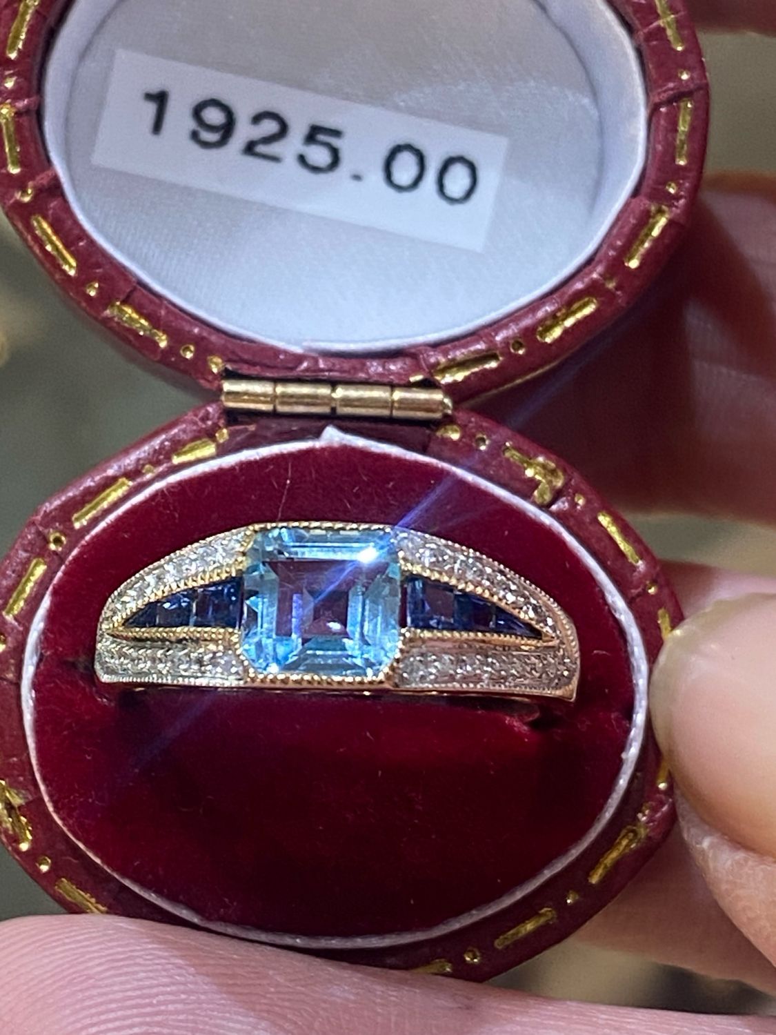 Blue Topaz Set With Sapphire And Diamond Accents