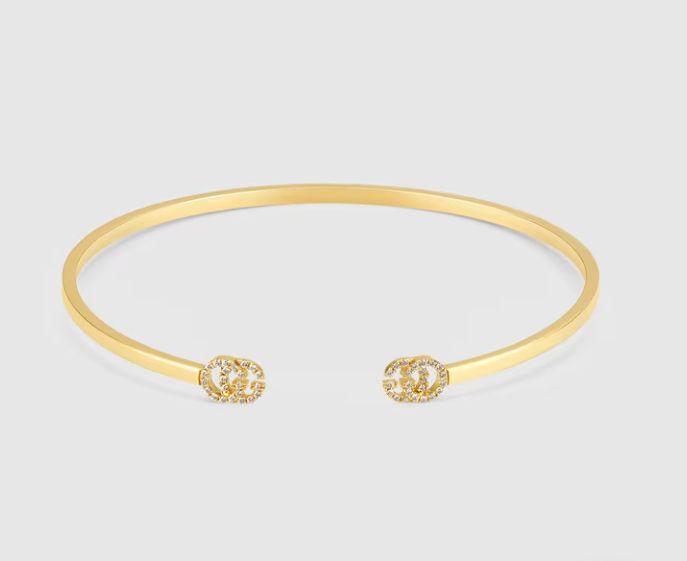 BRACCIALE GUCCI RIGIDO CON GG RUNNING E DIAMANTI