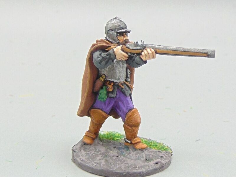 Dismounted Reiver in Steel Bonnet & Breastplate firing Caliver