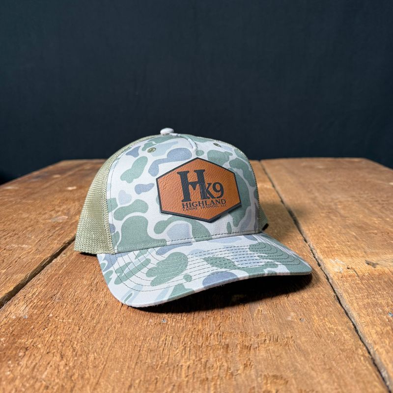 HK9 Green Duck Camo Hat with a Leather Logo