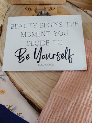 Sign "Beauty begins the moment you decide to be yourself"