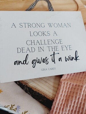 Sign "A strong woman..."