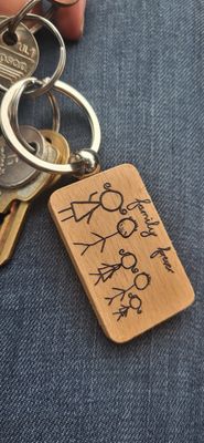 &quot;Designed by them&quot; Personalised Keyring