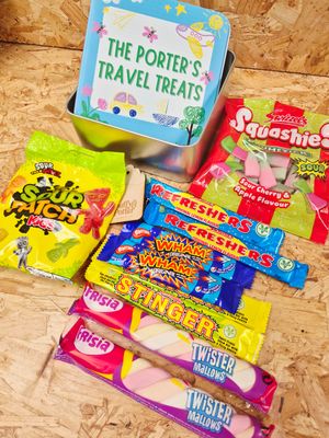 Personalised Travel Treats tin full of treats