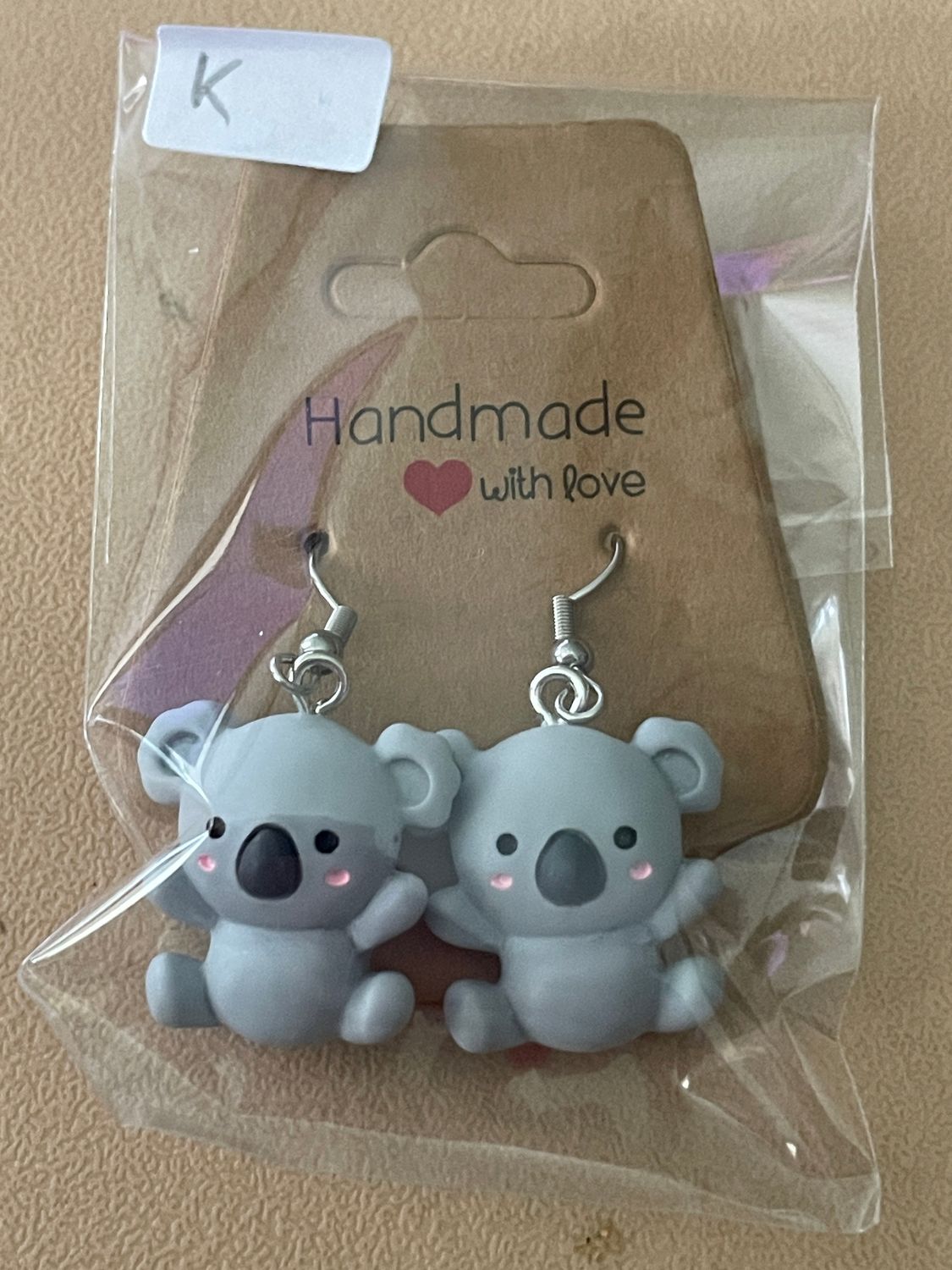 Merchandise; Earrings and Bookmarks