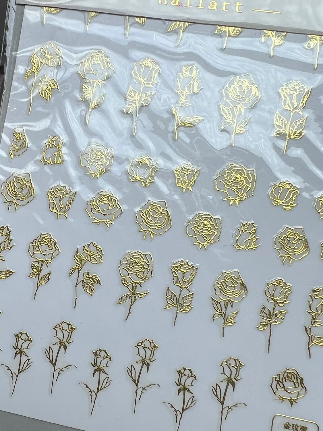 Tomoni stickers to 255 GOLD