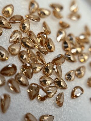Pear 2/3 mm D champagne 12 unit