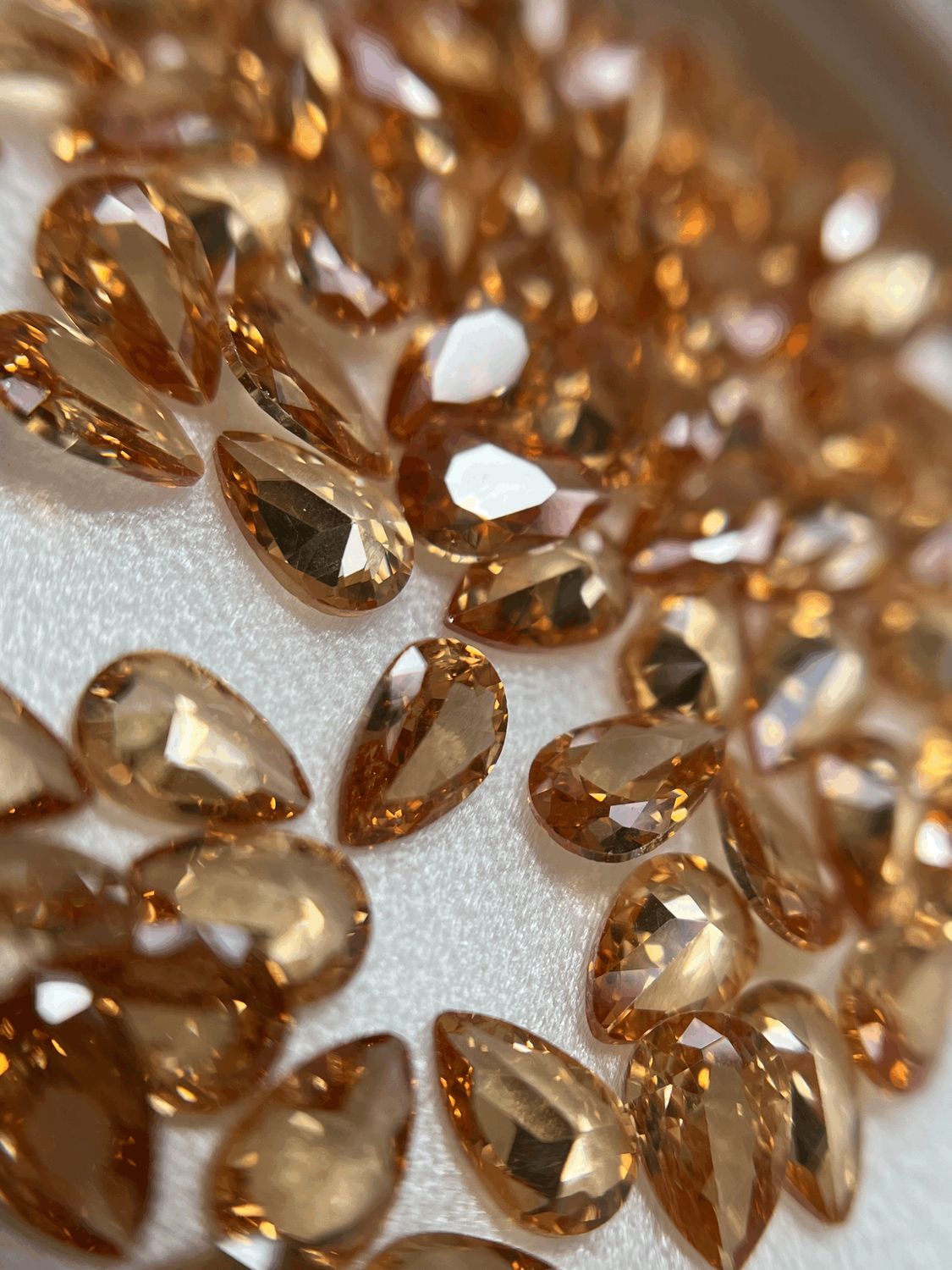 Pear 4/6  mm  D champagne  12 unit