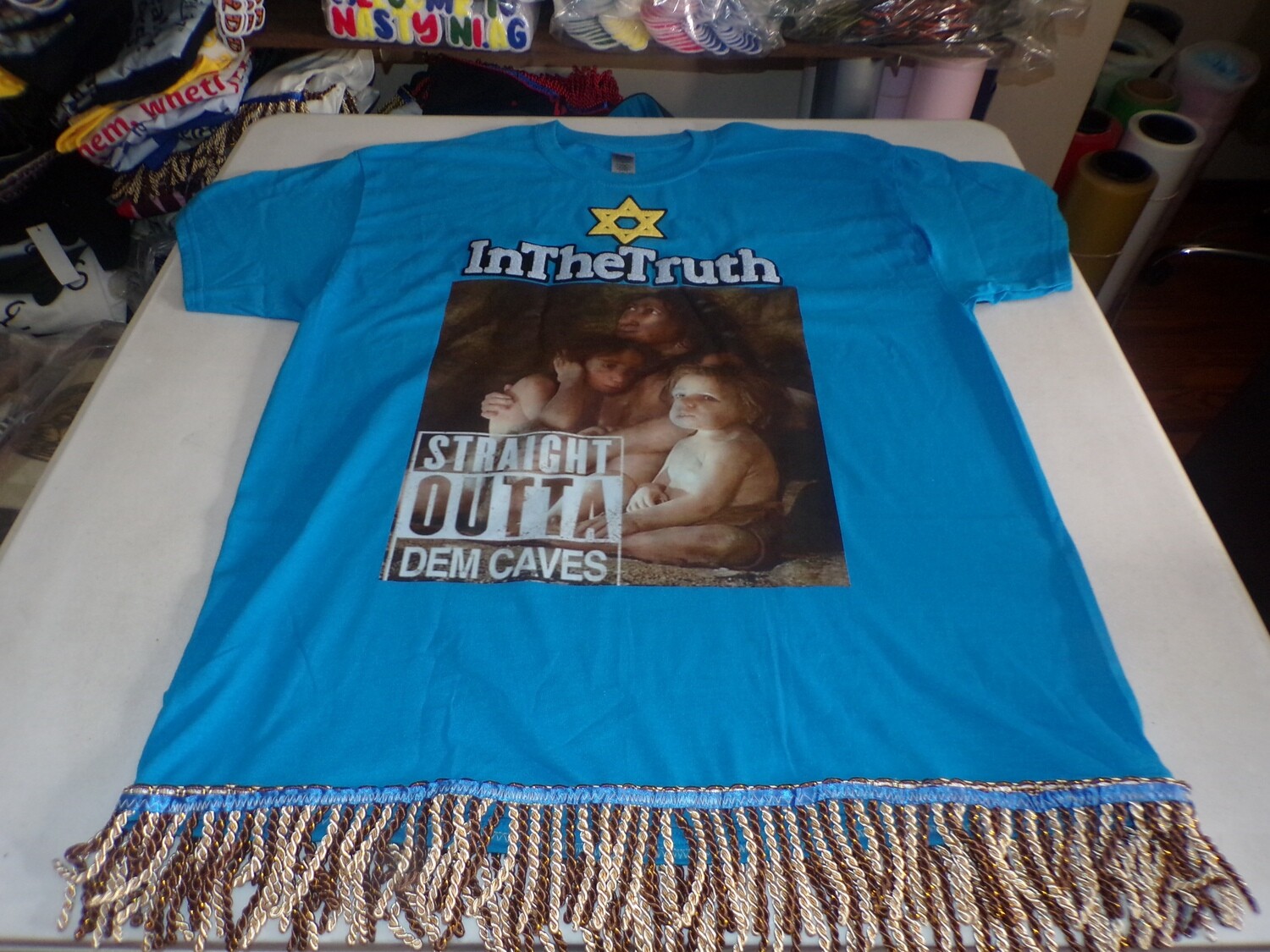 InTheTruth Straight Outta Dem Caves Tropical Blue Tee Brown/Gold Fringes
